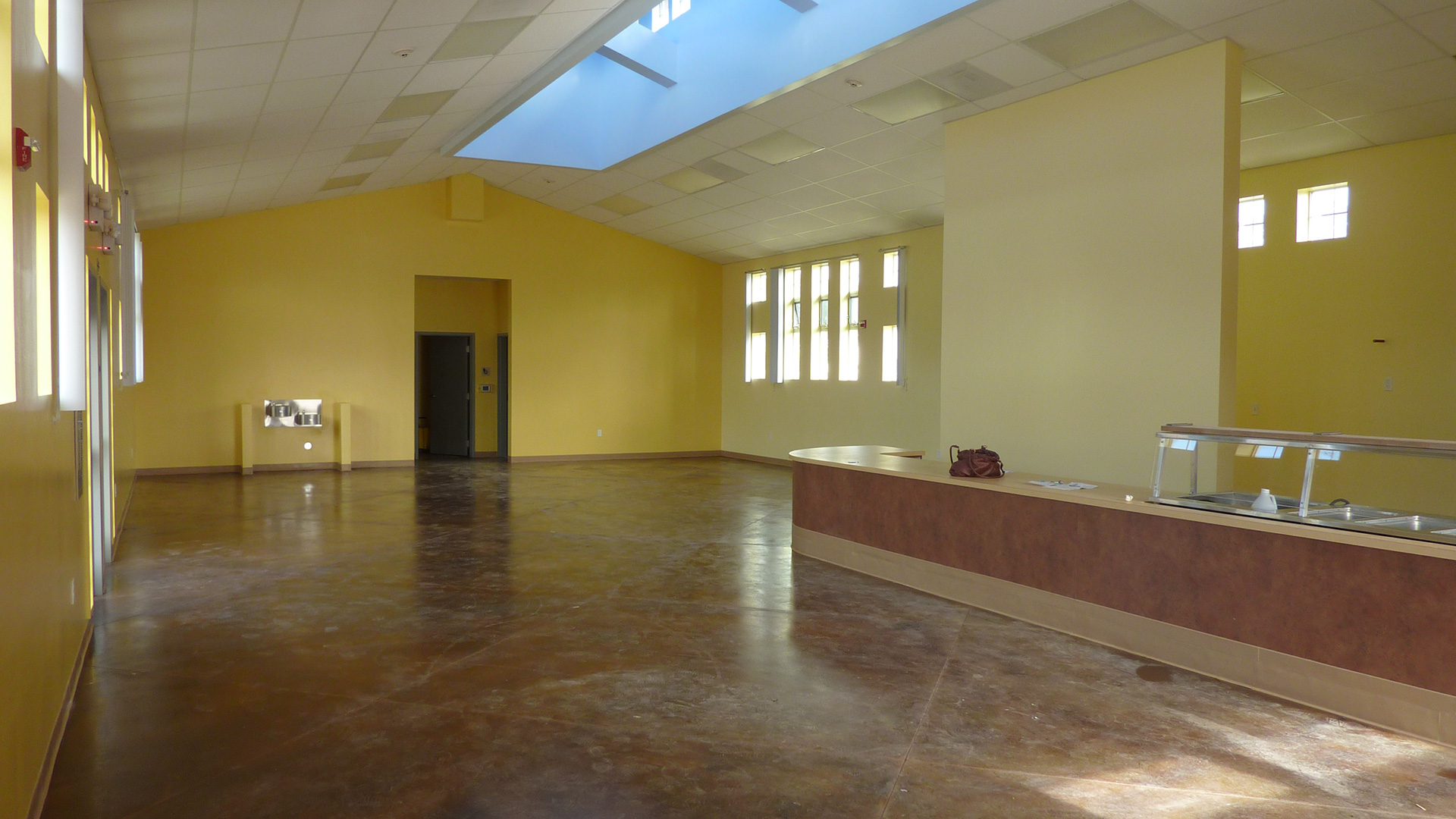 Interior of cafeteria before being furnished with seating or kitchen equipment.