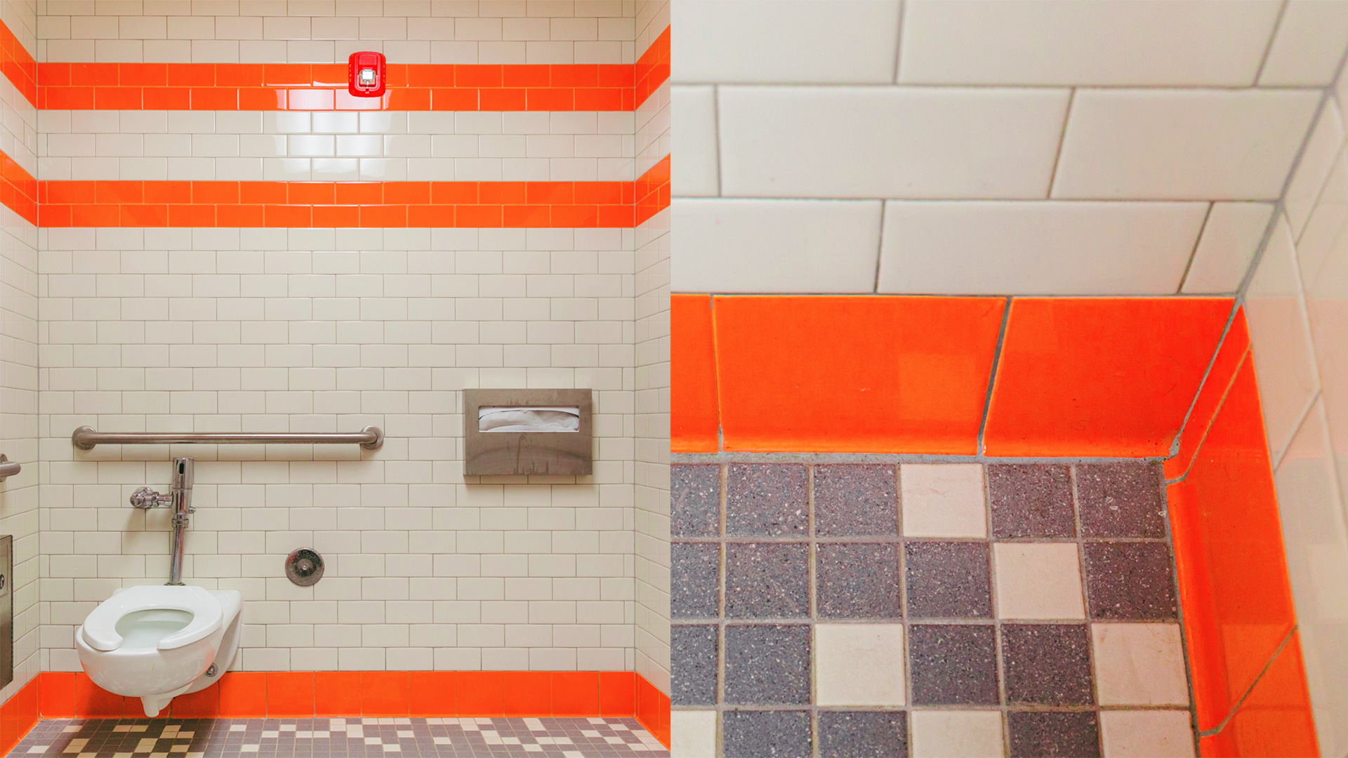 Portable restroom interior, with white and orange tiles, and gray tiles flooring.
