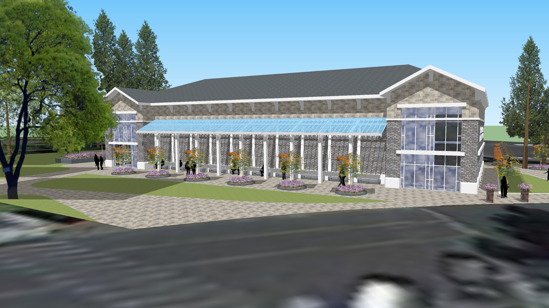 Rendering of theater exterior, vast stone walls with large class awning over a walkway in front of the building.