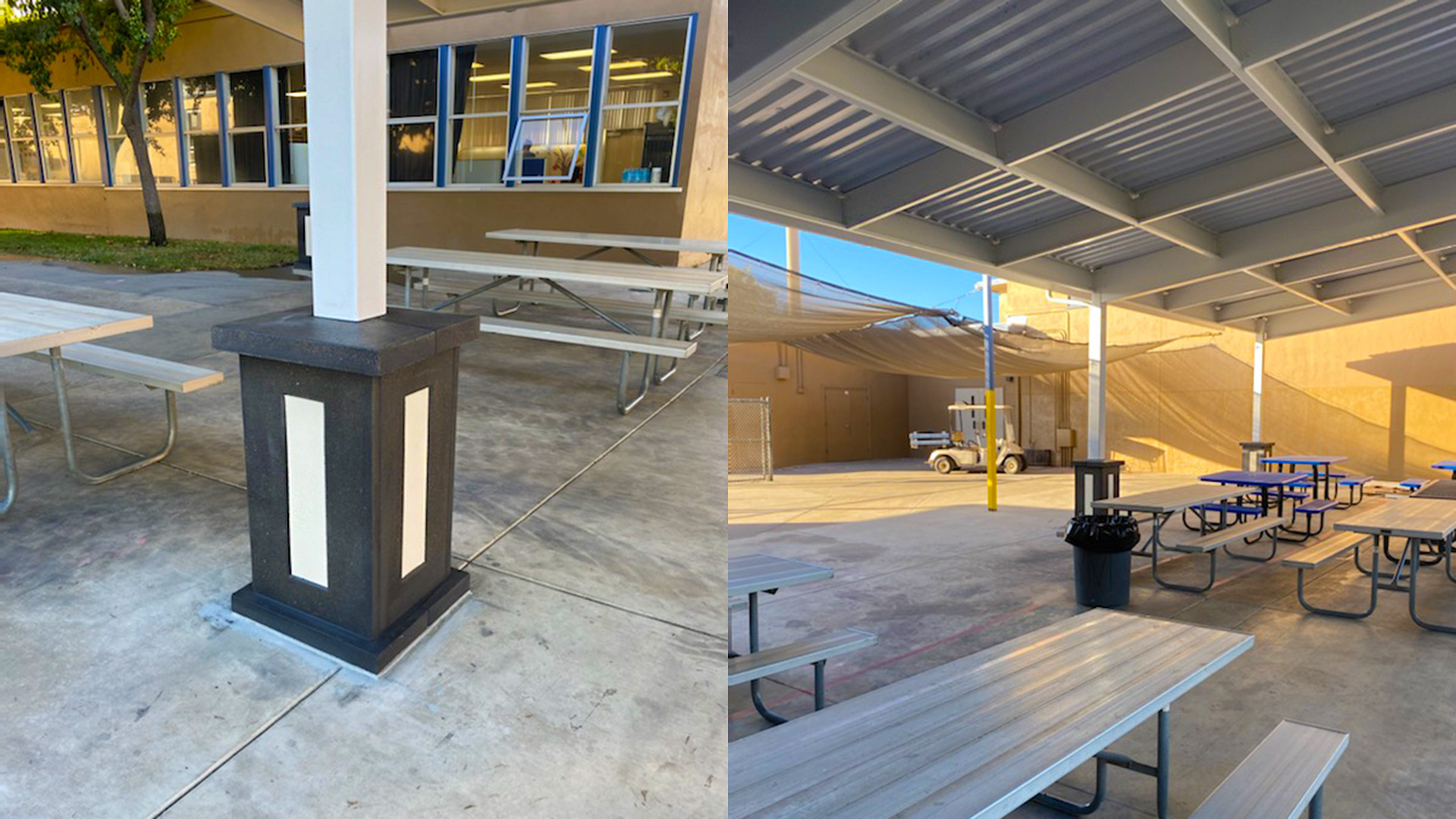 Gray and white bases of shade structure, and tables underneath currogated metal roof.