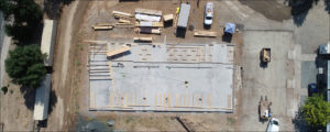 Top down view of building in early state of construction.